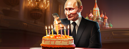 Владимир Путин держит в руке телефон и сидит за праздничным тортом